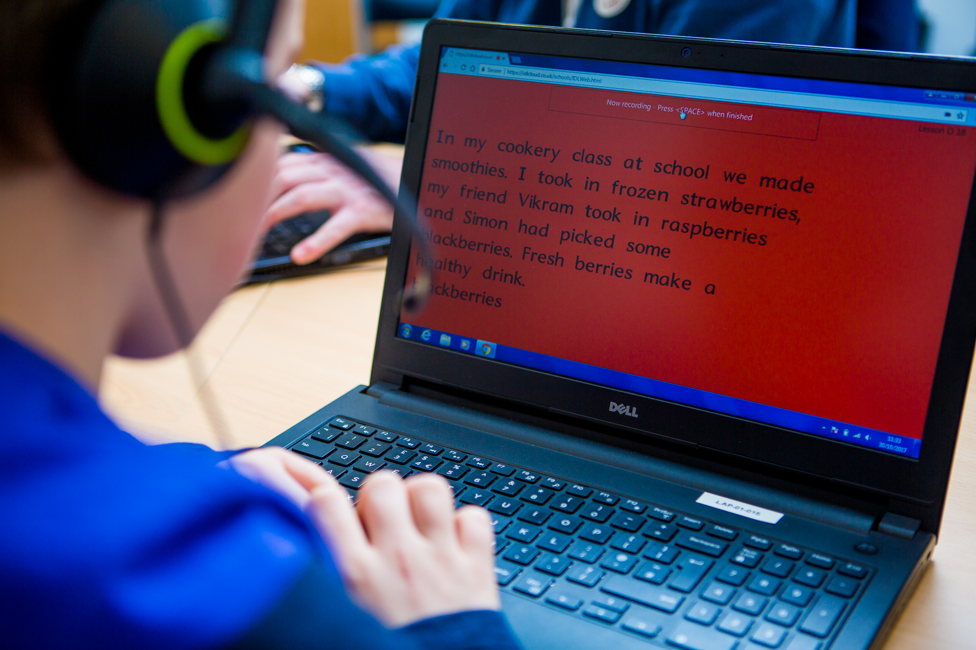 Touch typing and subject-specific spelling exercises